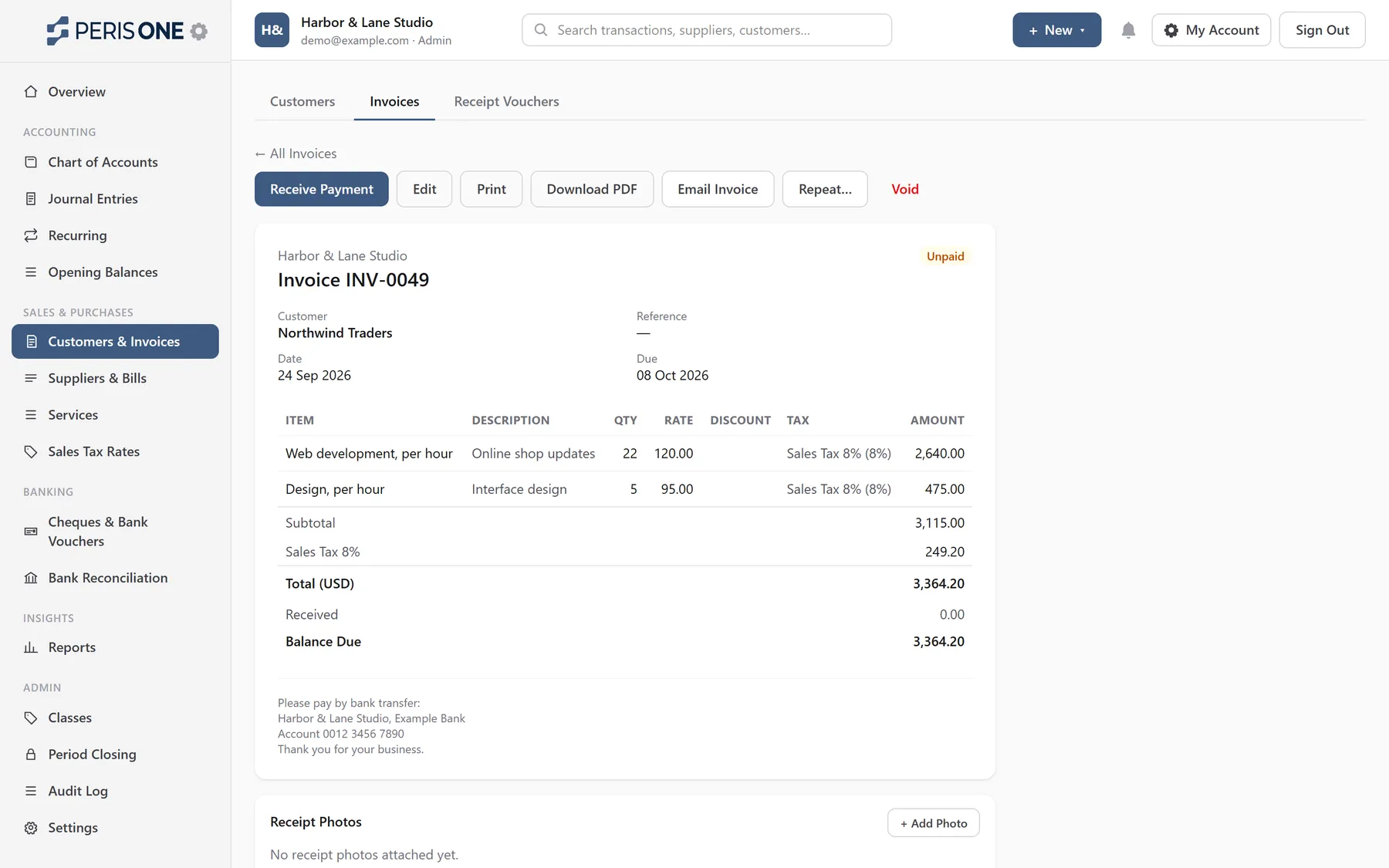 An invoice with service lines, sales tax, totals and payment details at the bottom